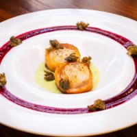 NS smoked salmon wrapped around Atlantic scallops and then seared & flamed with sherry.