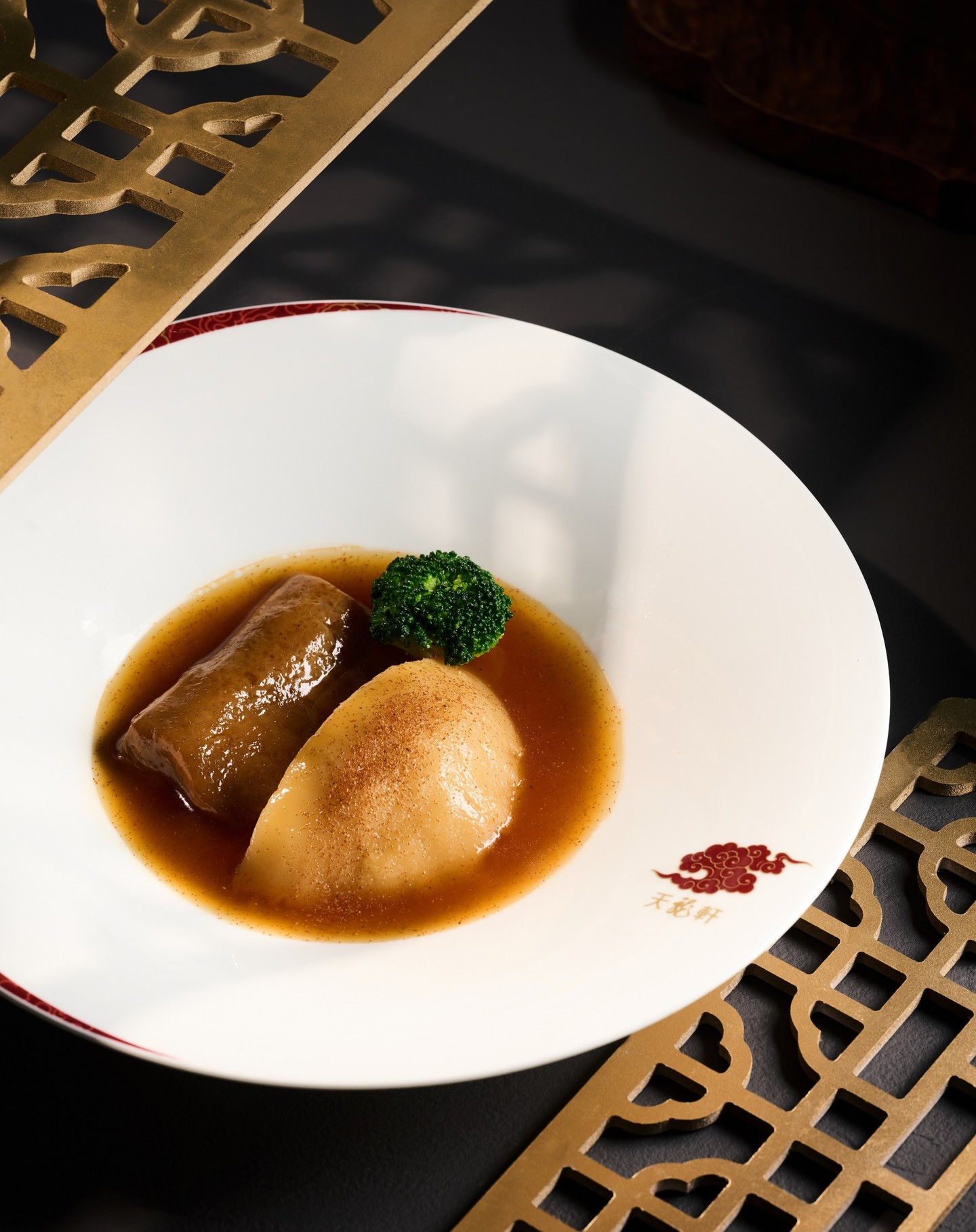 Braised Sea Cucumber with Pomelo Peel and Dried Shrimp Roe in Supreme Sauce.