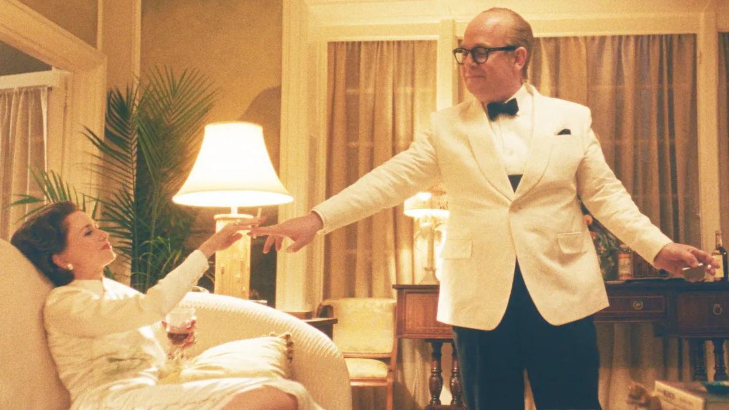 Naomi Watts as Babe Paley and Tom Hollander as Truman Capote in Feud: Capote vs. The Swans. Copyright 2024, FX. All rights reserved.