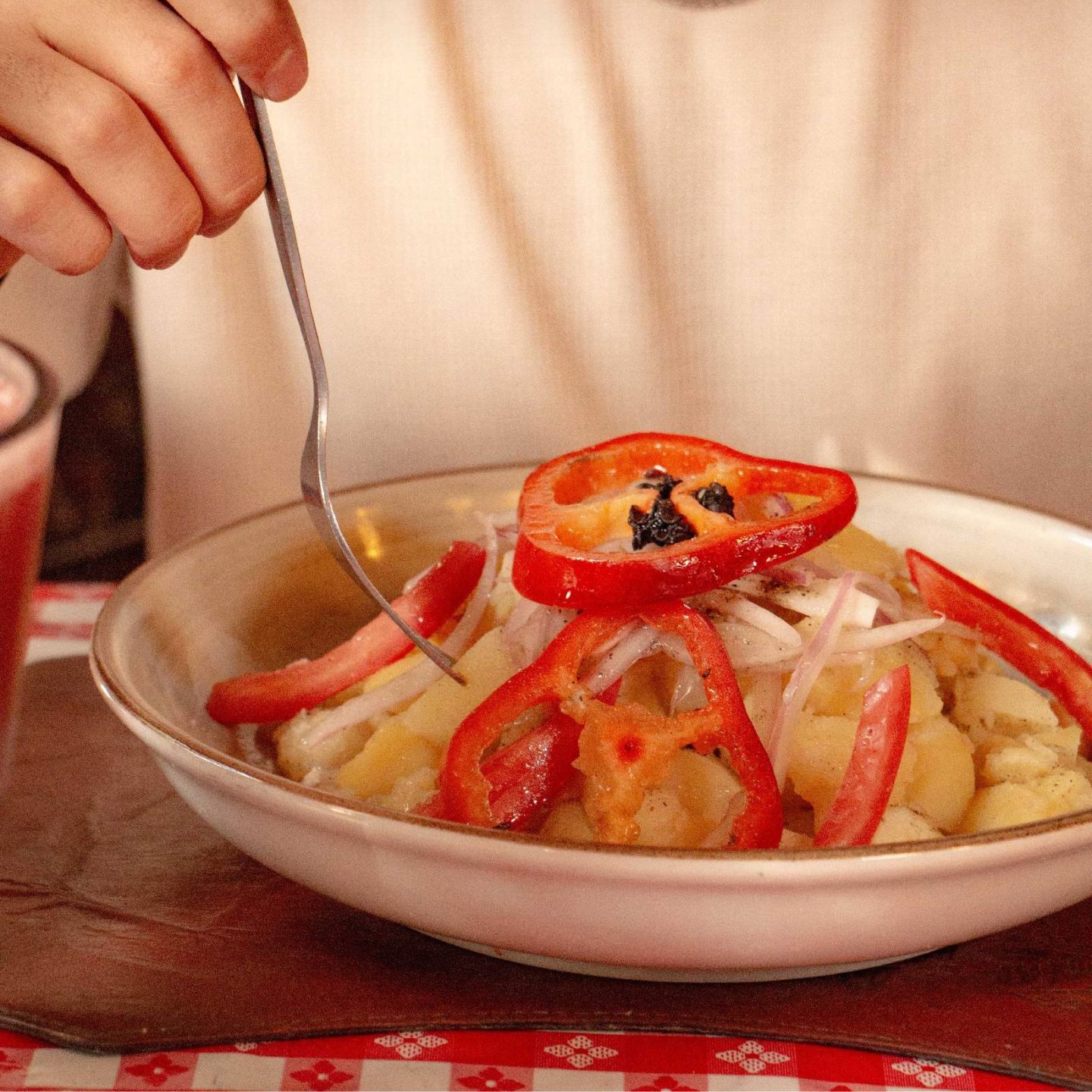 Escribano, a typical Arequipan dish made from mashed potatoes, tomatoes, vinegar and rocoto pepper.