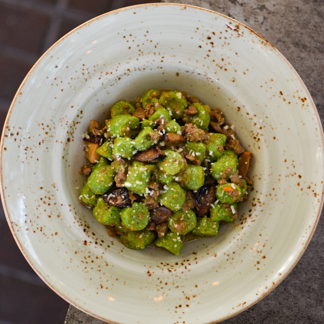 GNOCCHI DI RICOTTA ALL’ANATRA Spinach ricotta gnocchi, braised duck ragu, porcini mushrooms, parmigiano. Photo @sykitchen