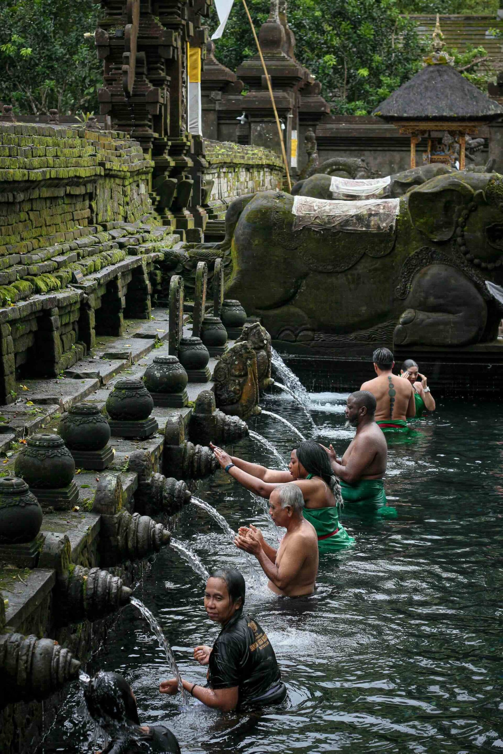 Tirta Empul Temple, nestled in Bali’s lush hills, is famed for its sacred spring and ritual purification pools.