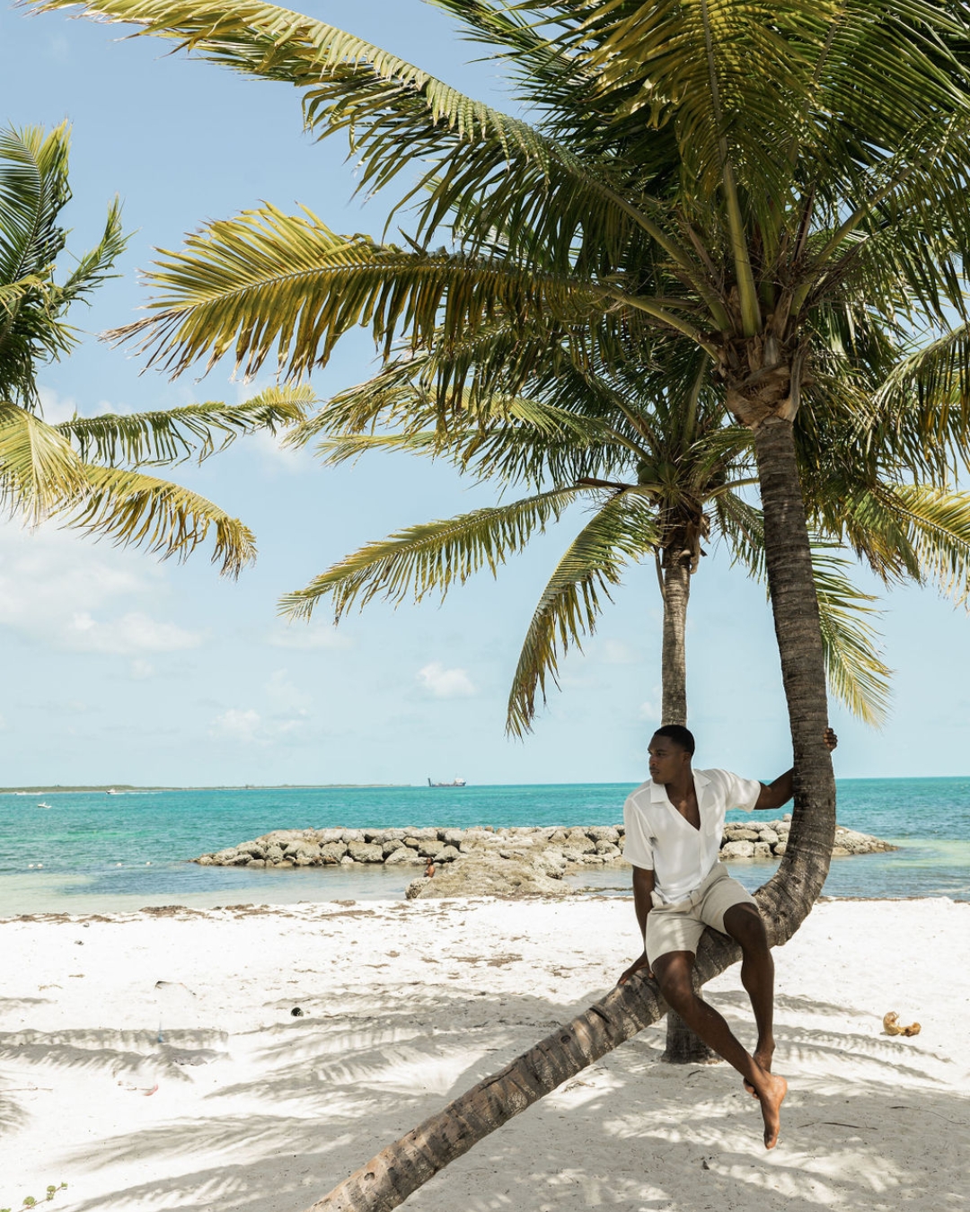 Life on Cable Beach moves at a different pace, where a palm tree becomes a front-row seat to the calm Caribbean.