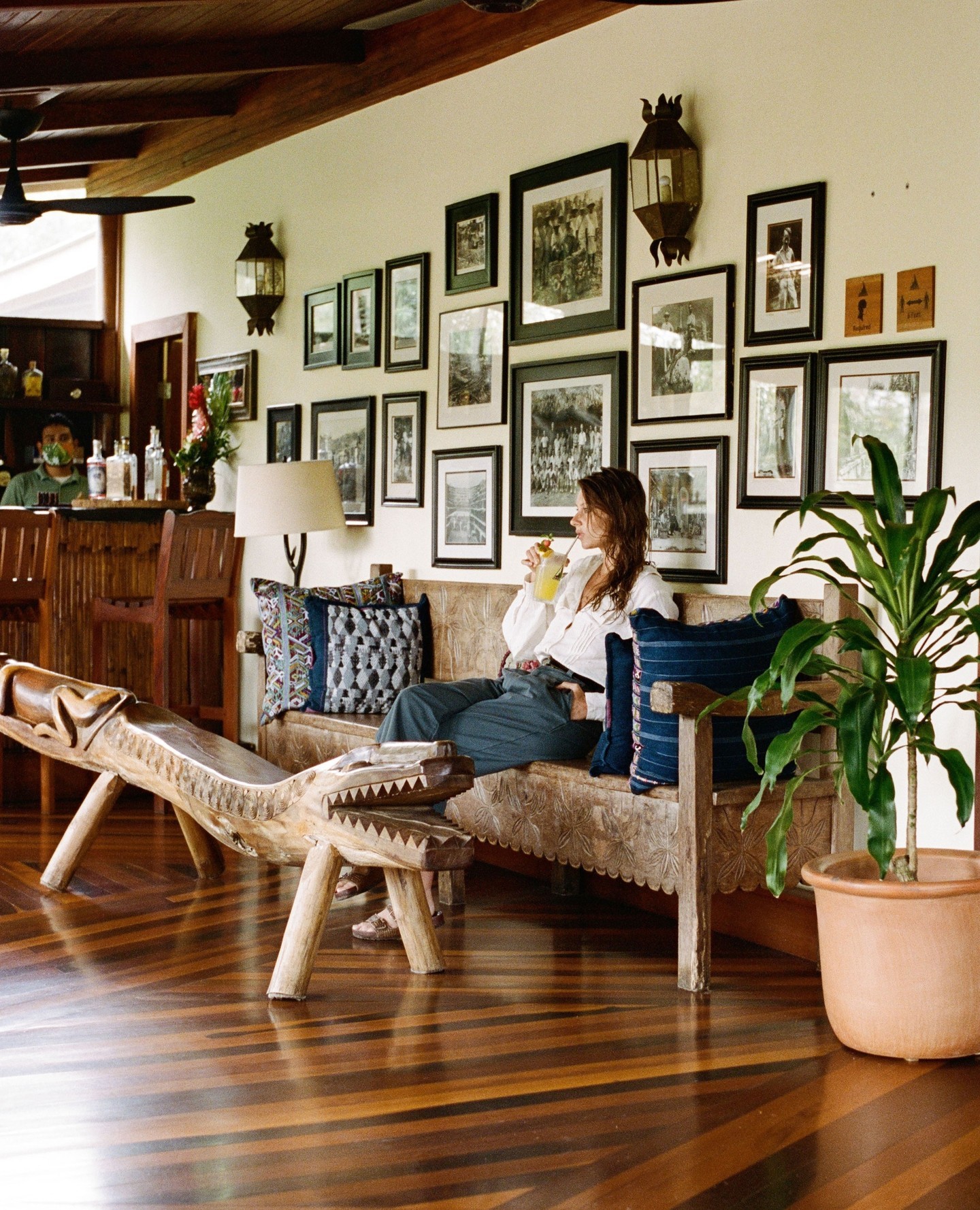 Tucked just past the welcome desk, the Jaguar Bar is surrounded by screened-in windows and marked by hand-carved slate, ceiling fans from the Apocalypse set, and framed photos of archaeological digs.