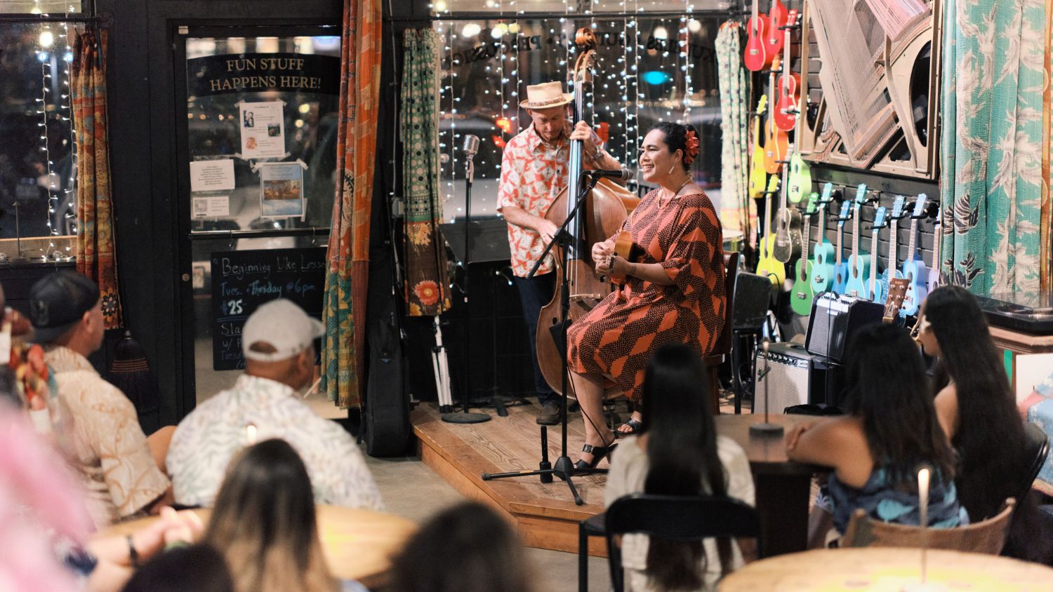 Kainani Kahaunaele performing at a local music shop