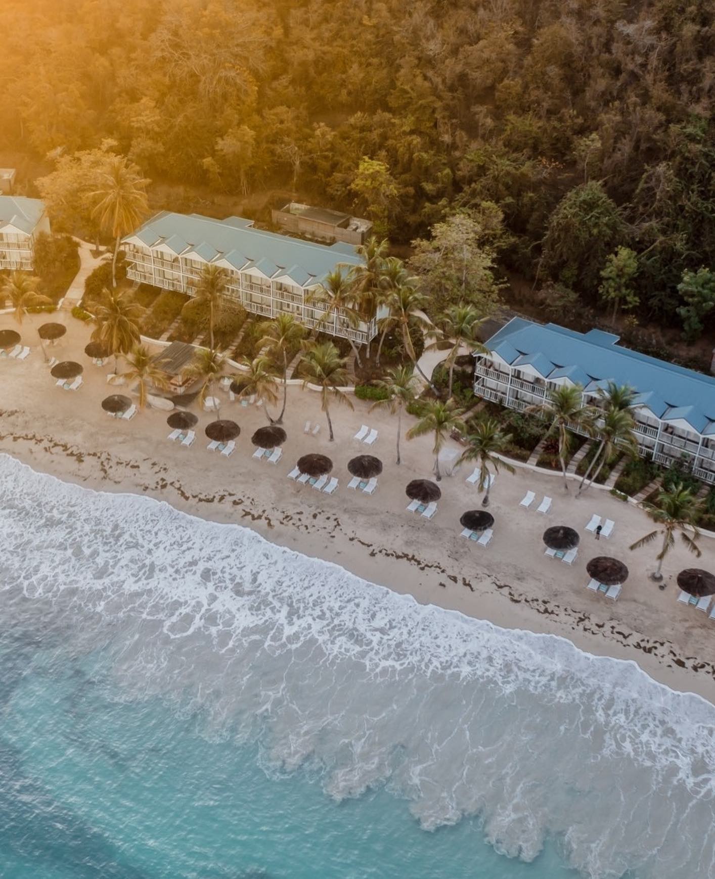 Soho Beach House Canouan in St. Vincent and the Grenadines, a luxury beachfront retreat with kayaking, sea turtle swims, and a Robinson Crusoe vibe.
