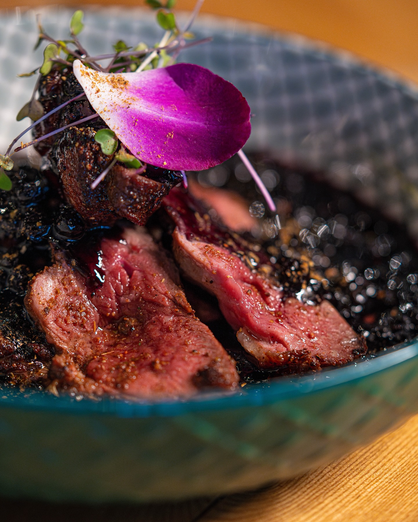 Garam Masala Duck Breast with wild blueberry curry at Pukka Toronto restaurant