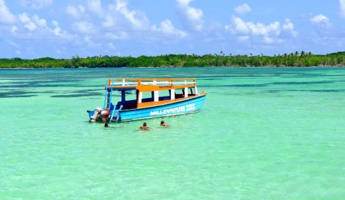 Swim in the legendary Nylon Pool, Tobago — a shallow, crystal-clear oasis with soft white sand, snorkeling, and a touch of romance.