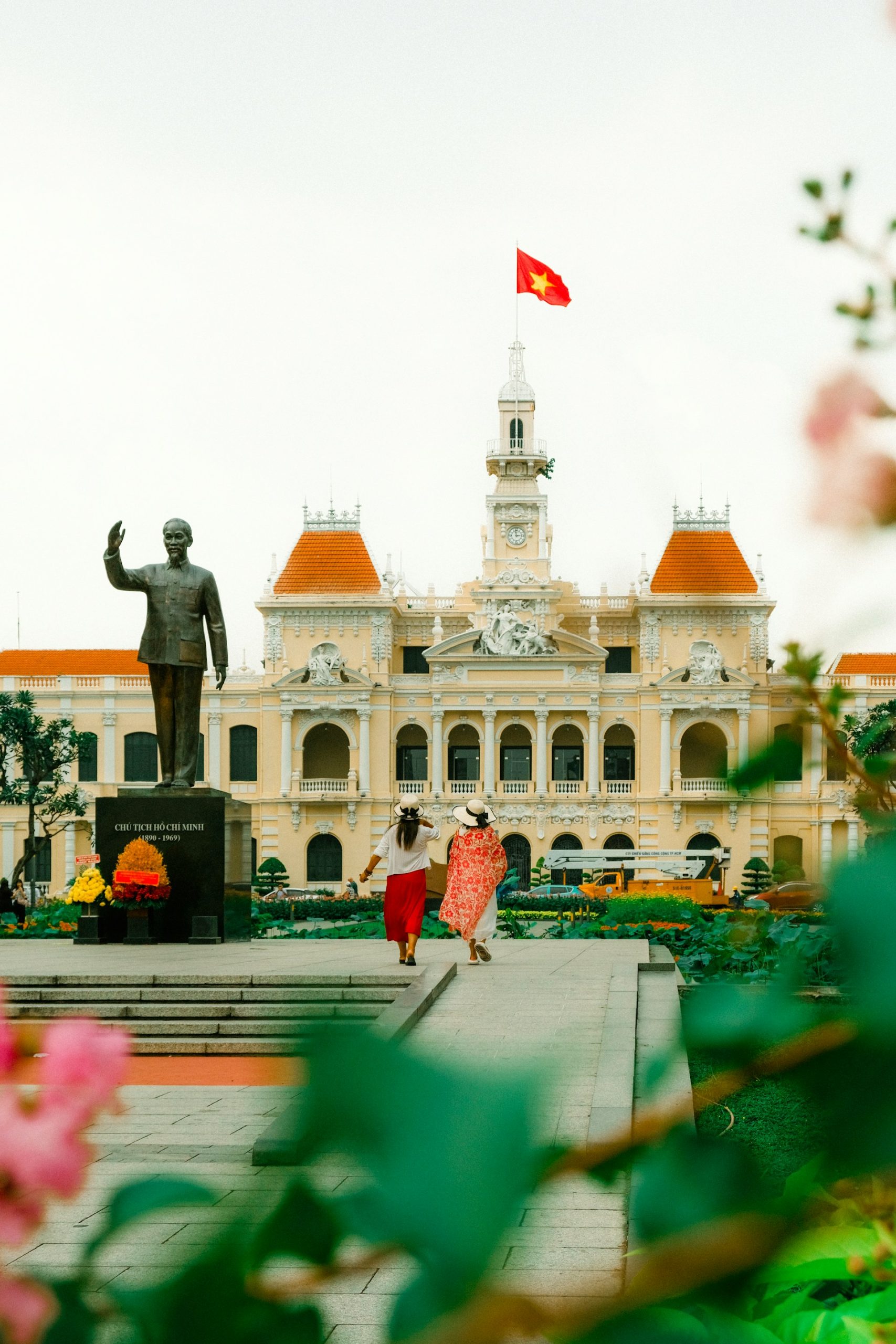 People’s Committee of Ho Chi Minh City building in District 1, reflecting French colonial architecture from the period of French Indochina, with arched windows and a central clock tower.