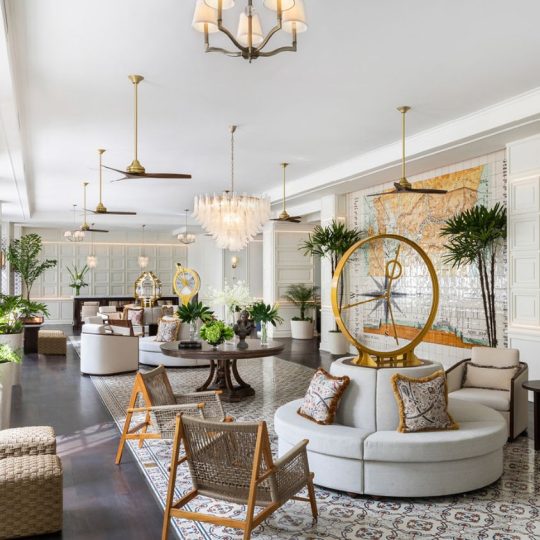 Nautical touches in the lobby, from a vintage ship’s telegraph to lush green and white blooms, complement the sparkling crystal chandelier at Sofitel Legend Casco Viejo. Photo: Courtesy of Sofitel Legend Casco Viejo