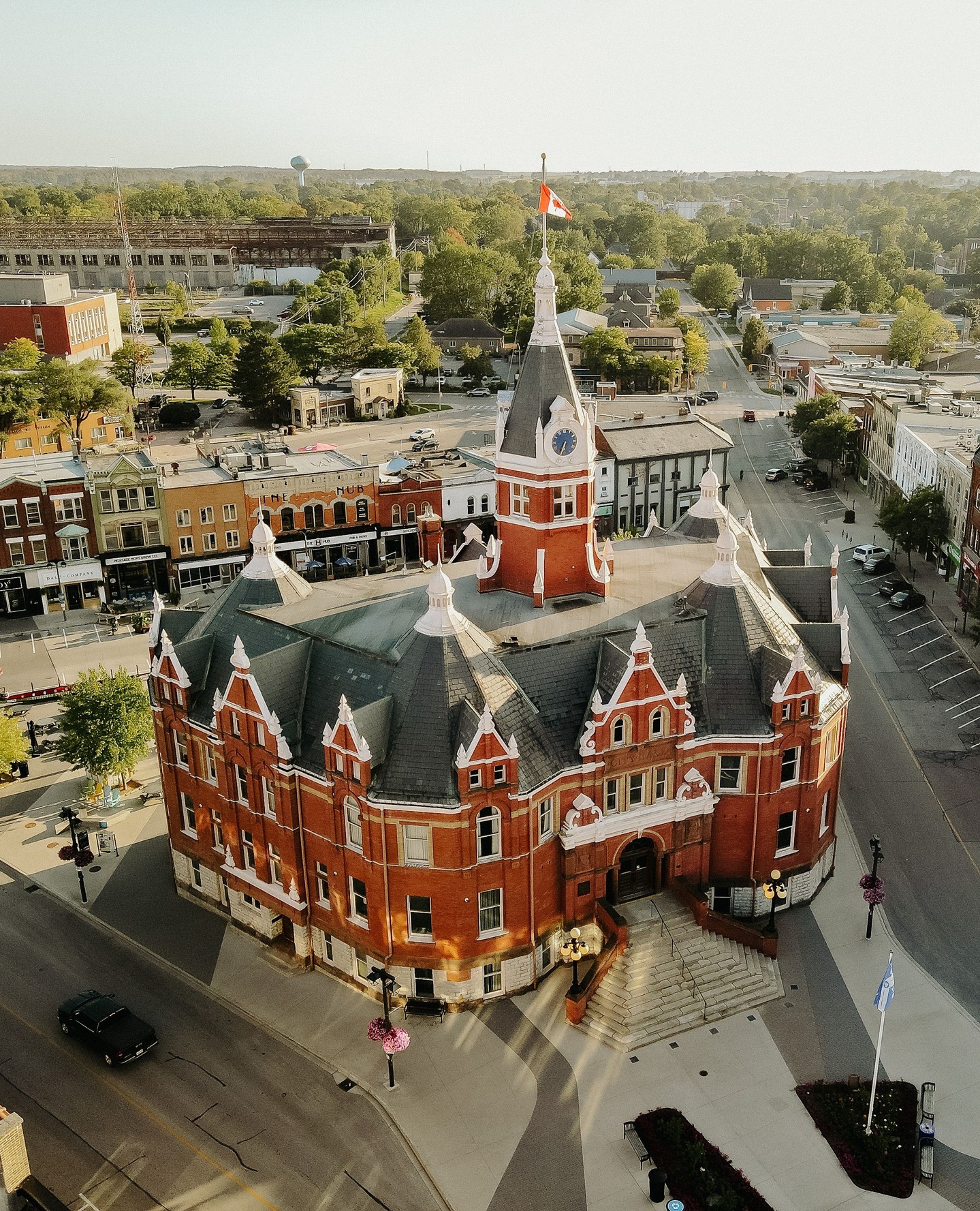 The red-brick charm of Stratford City Hall rises gracefully over the historic heart of Stratford, its clock tower standing as a timeless landmark amid the city’s scenic streets.