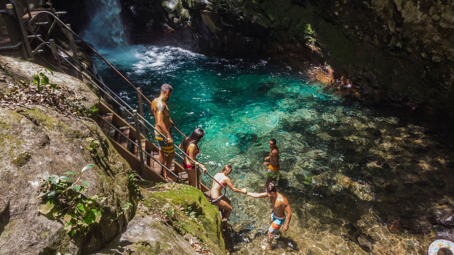 In Costa Rica’s Rincón de la Vieja National Park, Oropéndula Waterfall tumbles through a steep volcanic gorge into a glowing turquoise basin below. Opposite: